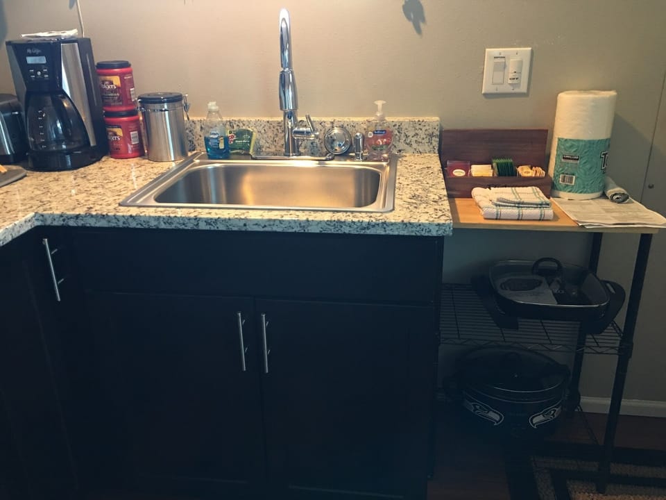 Kitchen with coffee maker, toaster, crockpot and even an electric skillet.