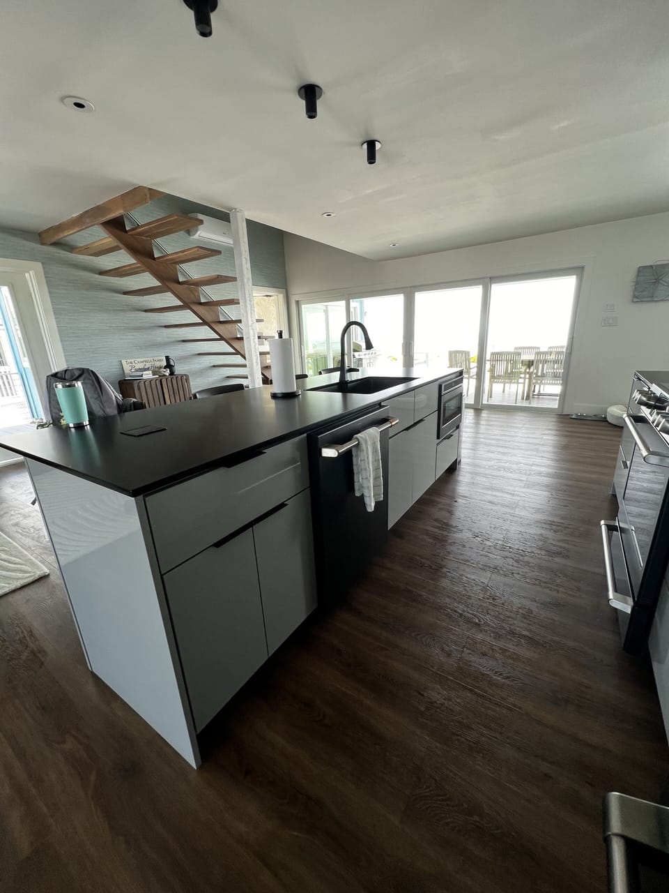 Sink, Dishwasher and Microwave Island with seating for four. 