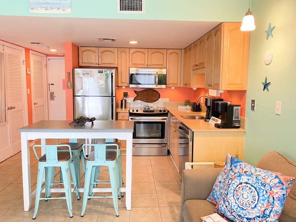 Full kitchen with stainless steel appliances.  