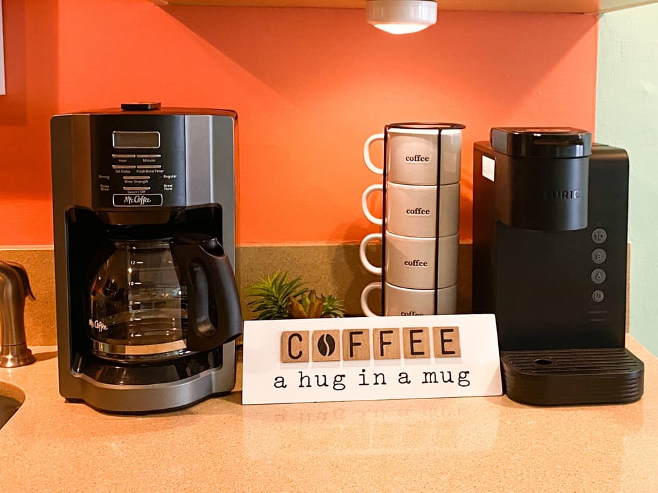 Regular coffee pot and a Keurig.