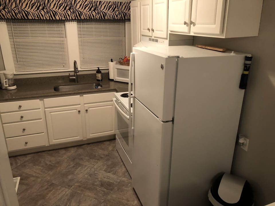 Kitchen stocked with items great for a short or a long-term stay!