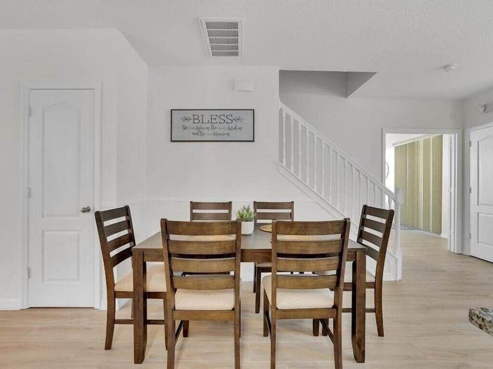 Modern dining table with seating for six, perfect for shared meals and quality time.