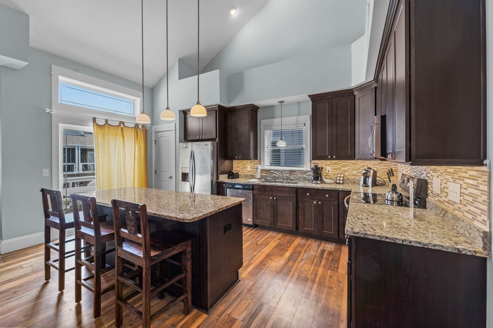 Kitchen with Bar Seating on Second Level