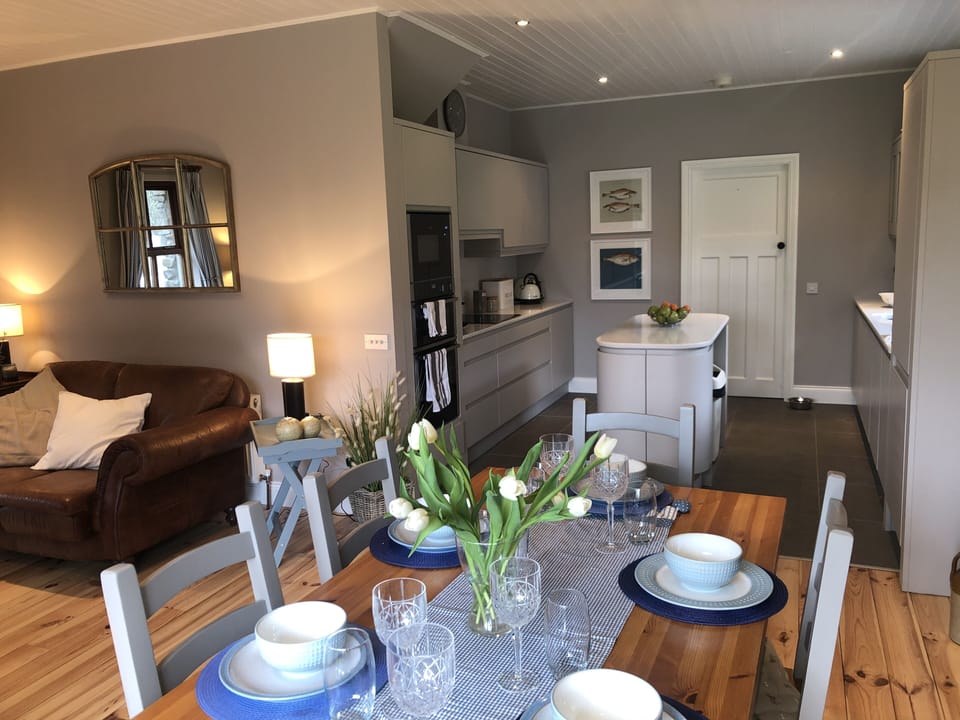 A fully equipped kitchen complete with coffee machine and Kitchen Aid