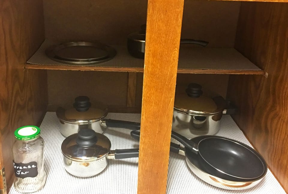 Assorted pots and pans provided.