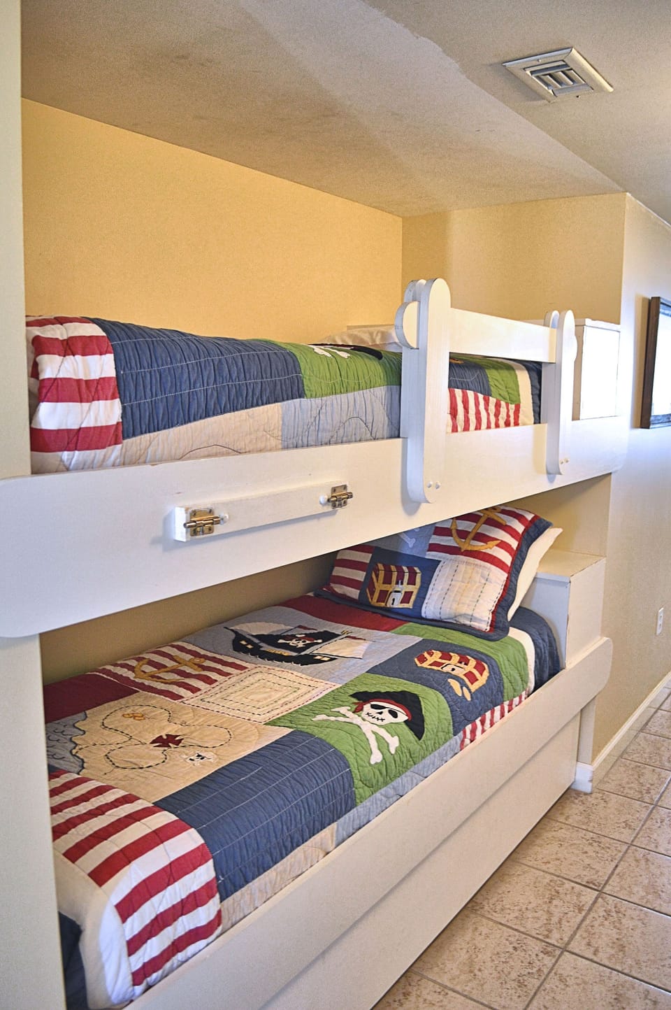 Twin bunks located in the hall before you reach the second full bathroom.