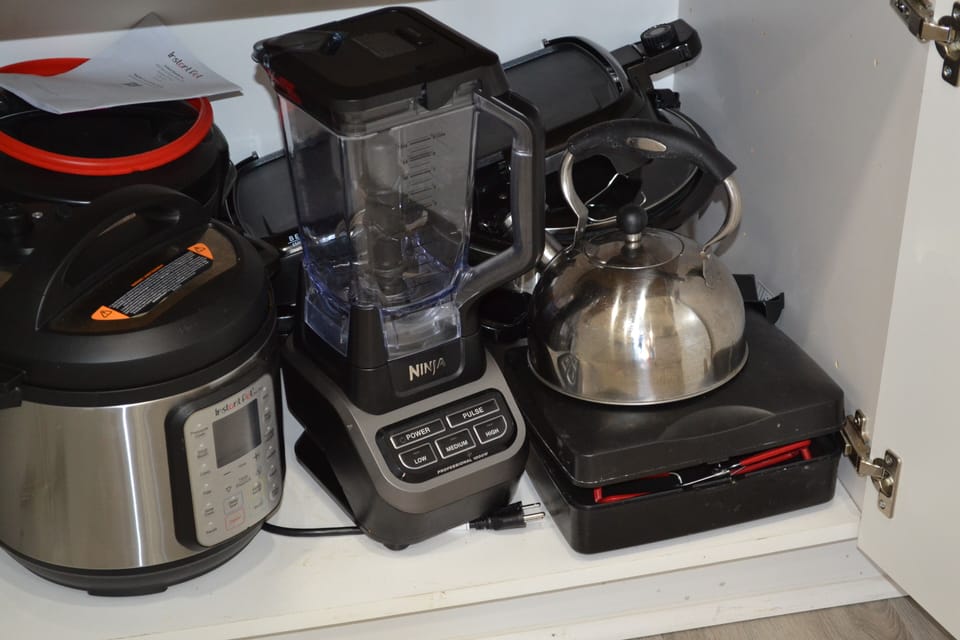 Small electric appliances. Insta Pot, Ninja blender, waffle maker & slow cooker.