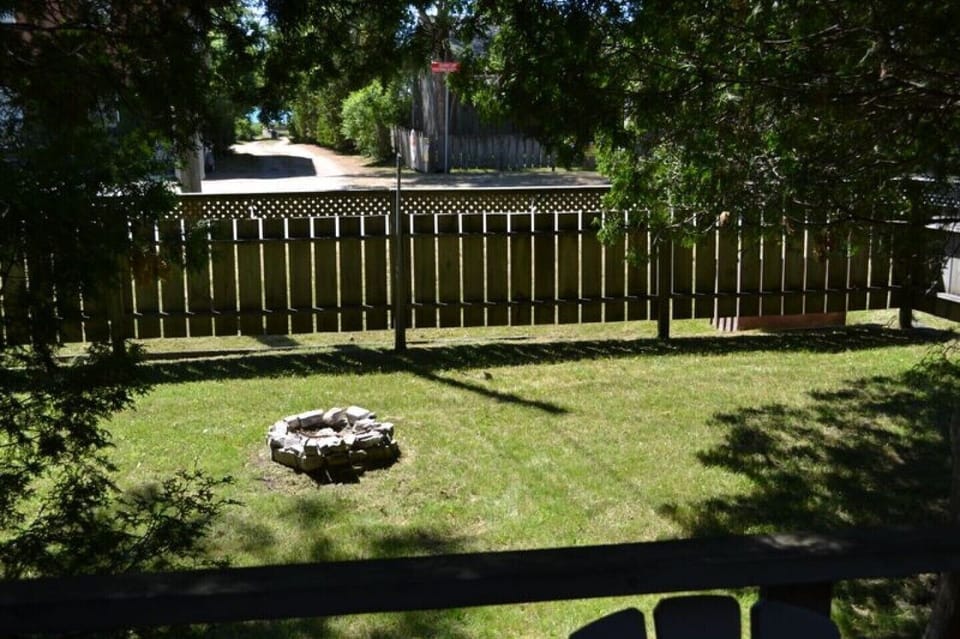 A private fire pit off of the front deck