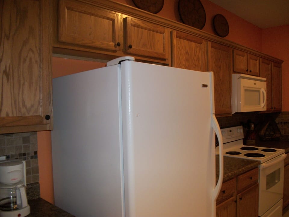 Lg Frig w icemaker, coffee maker, toaster & toaster oven, blender, crock pot