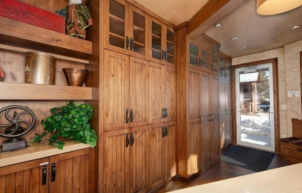 Basement entryway to enter from the ski slopes. Closets for ski/gear storage, mini fridge and dishwasher.