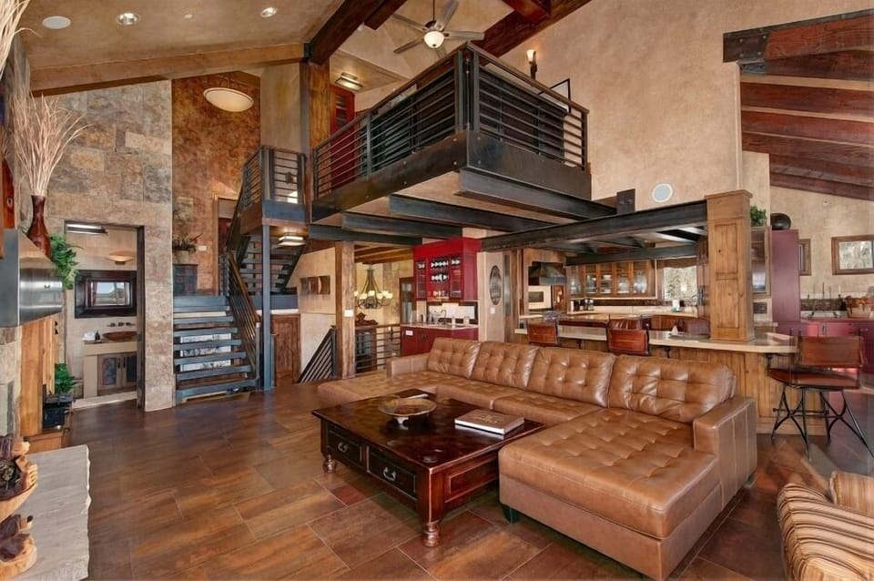 Main level living area with gas fireplace and smart TV.