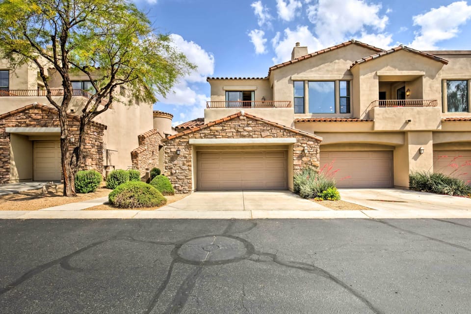 Townhome Exterior | Garage Parking (1 Vehicle)