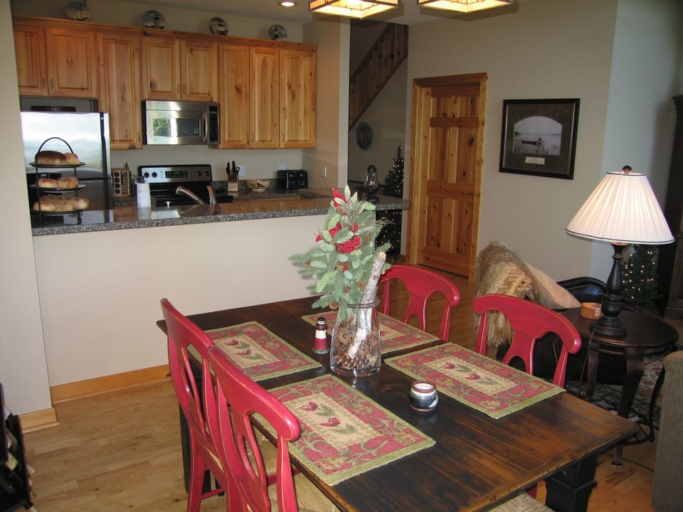 The kitchen opens to the dining area, there's a great lake view from both rooms.