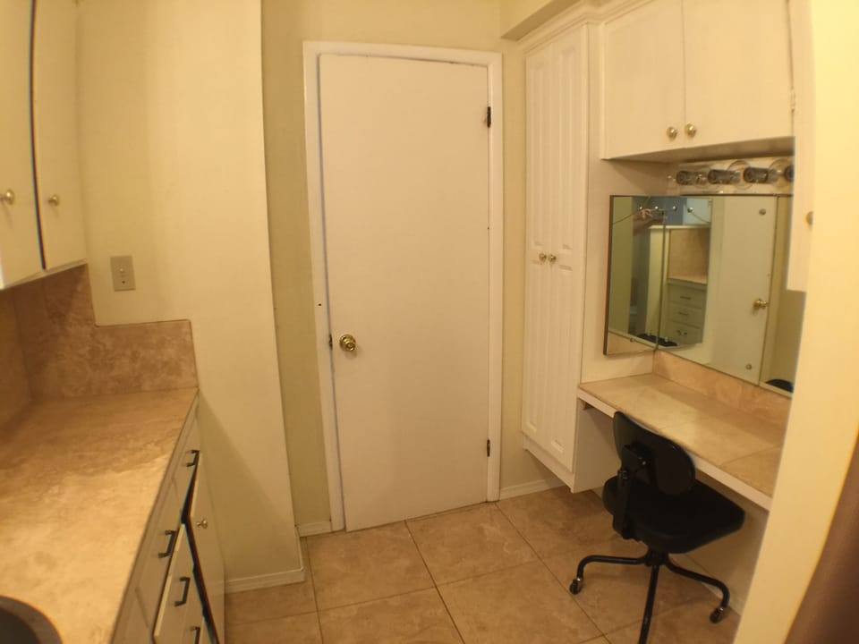 Main bathroom with makeup vanity