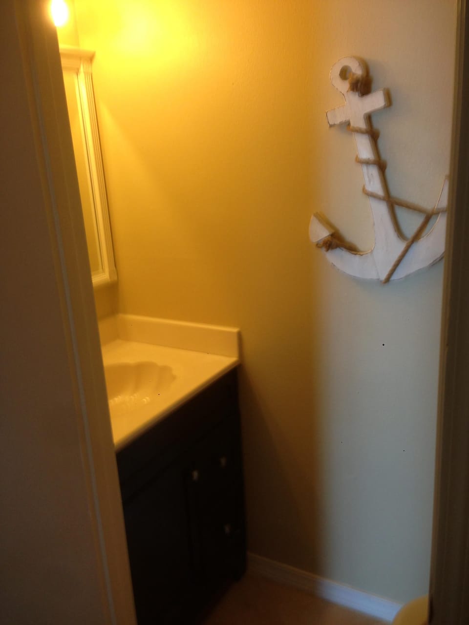 Half bath next to kitchen on 2nd floor