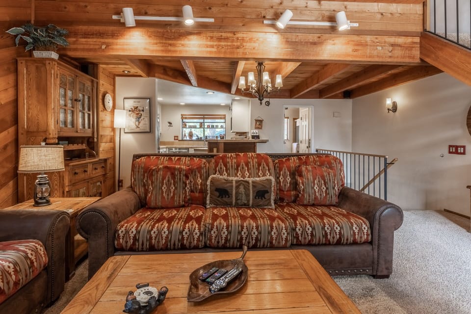 Living Room / Flat Screen TV / Wood Burning Fireplace