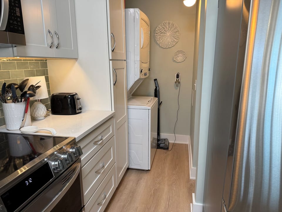 Stackable washer/dryer in the back as well 