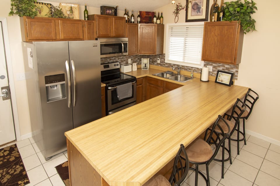 Fully equipped kitchen with stainless steel appliances