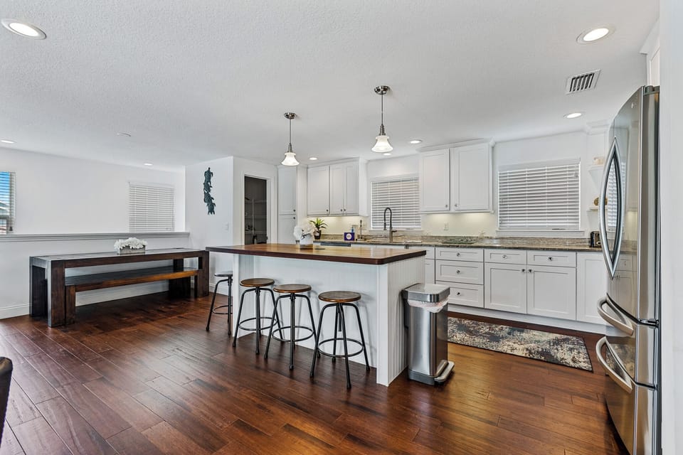 Large island for serving and entertaining in the kitchen of this home for rent new Smyrna beach.