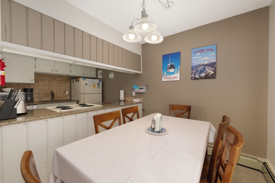 Your fully equipped kitchen and dining space combines convenience with comfort, featuring granite counters and seating for six.
