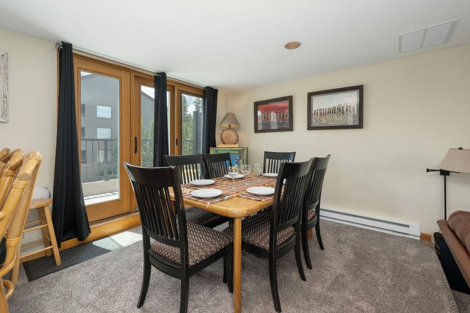Gather around this inviting dining table for memorable meals with loved ones in your comfortable, well-appointed space.