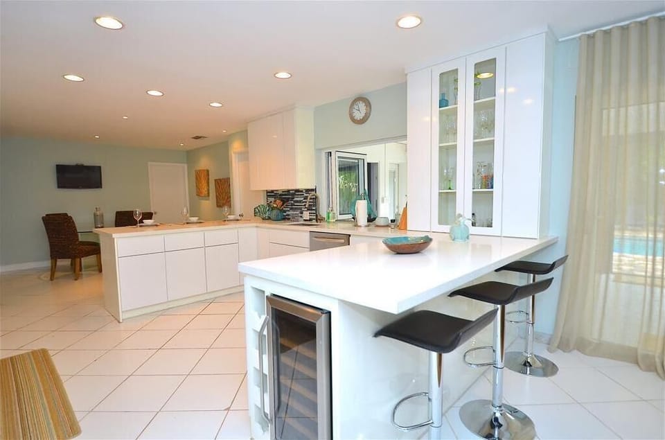 Spectacular Remodeled Kitchen (Fully Equipped) Offers Counter Dining For Six (6) + Formal Dining For Eight (8) + Breakfast Dining For Four (4) + Direct Pool & Lounge Access & Views...
