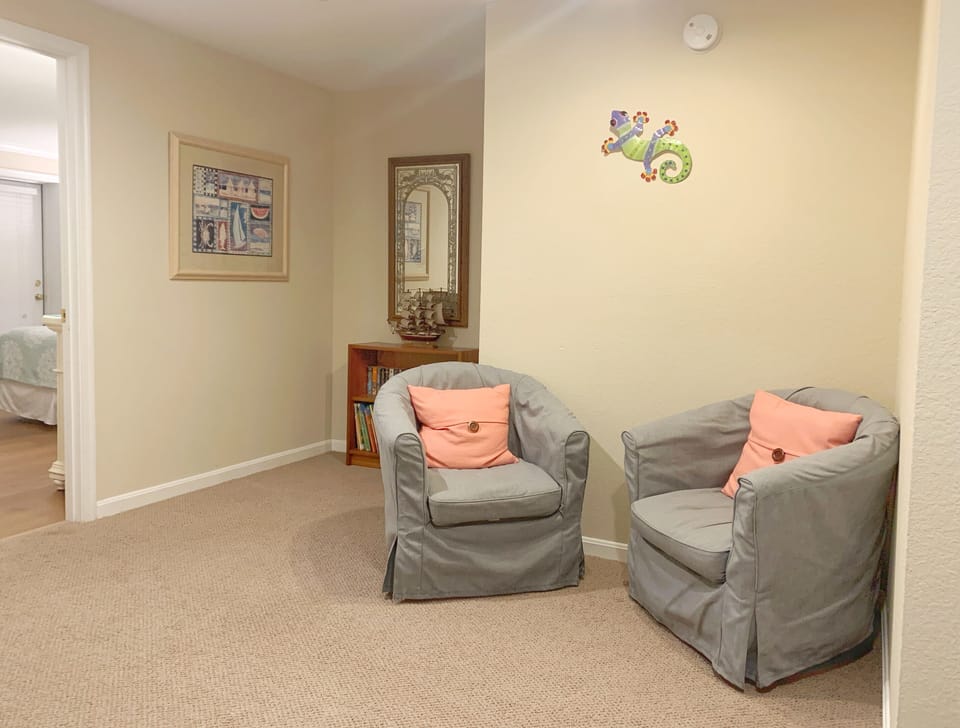 Family Room Conversation Adjacent to Lower-Level Queen-Twin Coastal Bedroom.