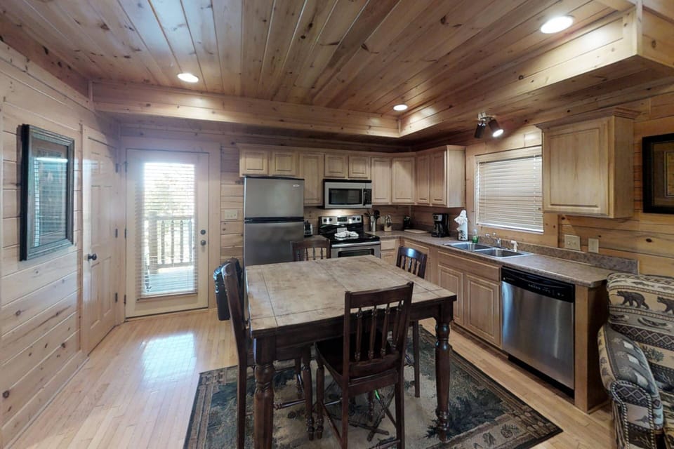 The dining table sits 4 guests comfortably. Doubles as a game table!