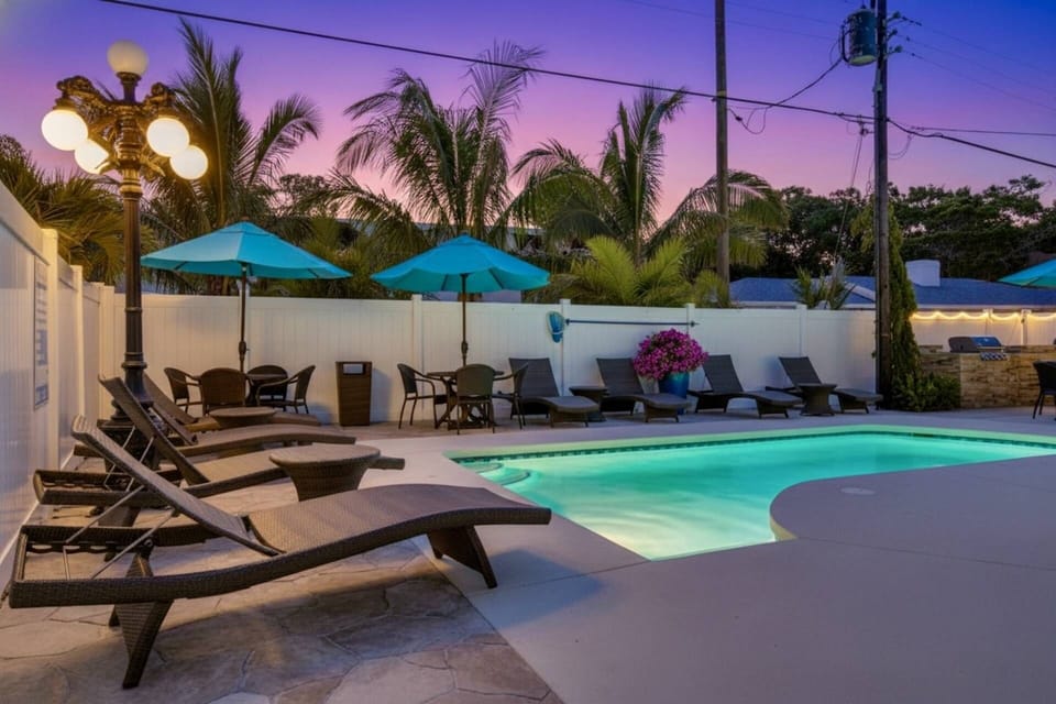 Lounge by the pool for a night swim in the heated pool!