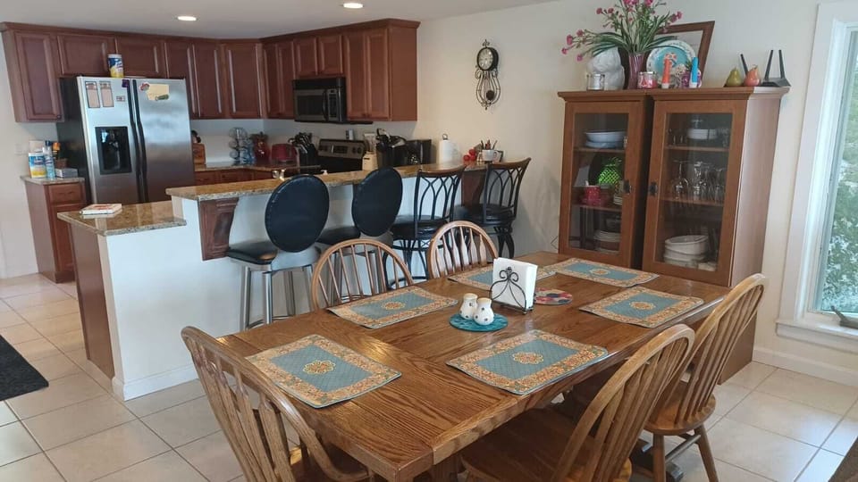 Perfect Lakefront Getaway, Maine. Spacious dining room area for your family.