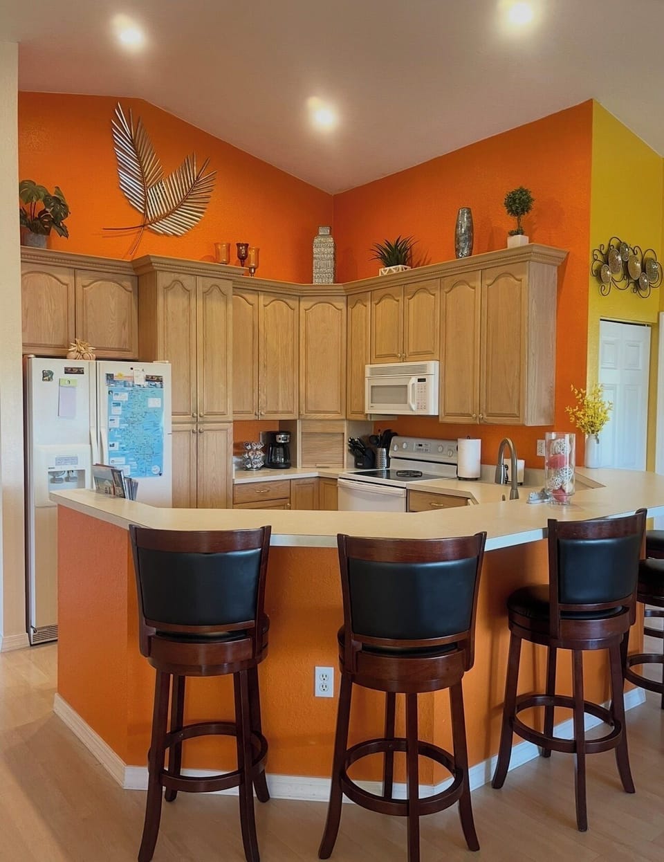 Open kitchen, on the right by bifold door is washer & dryer