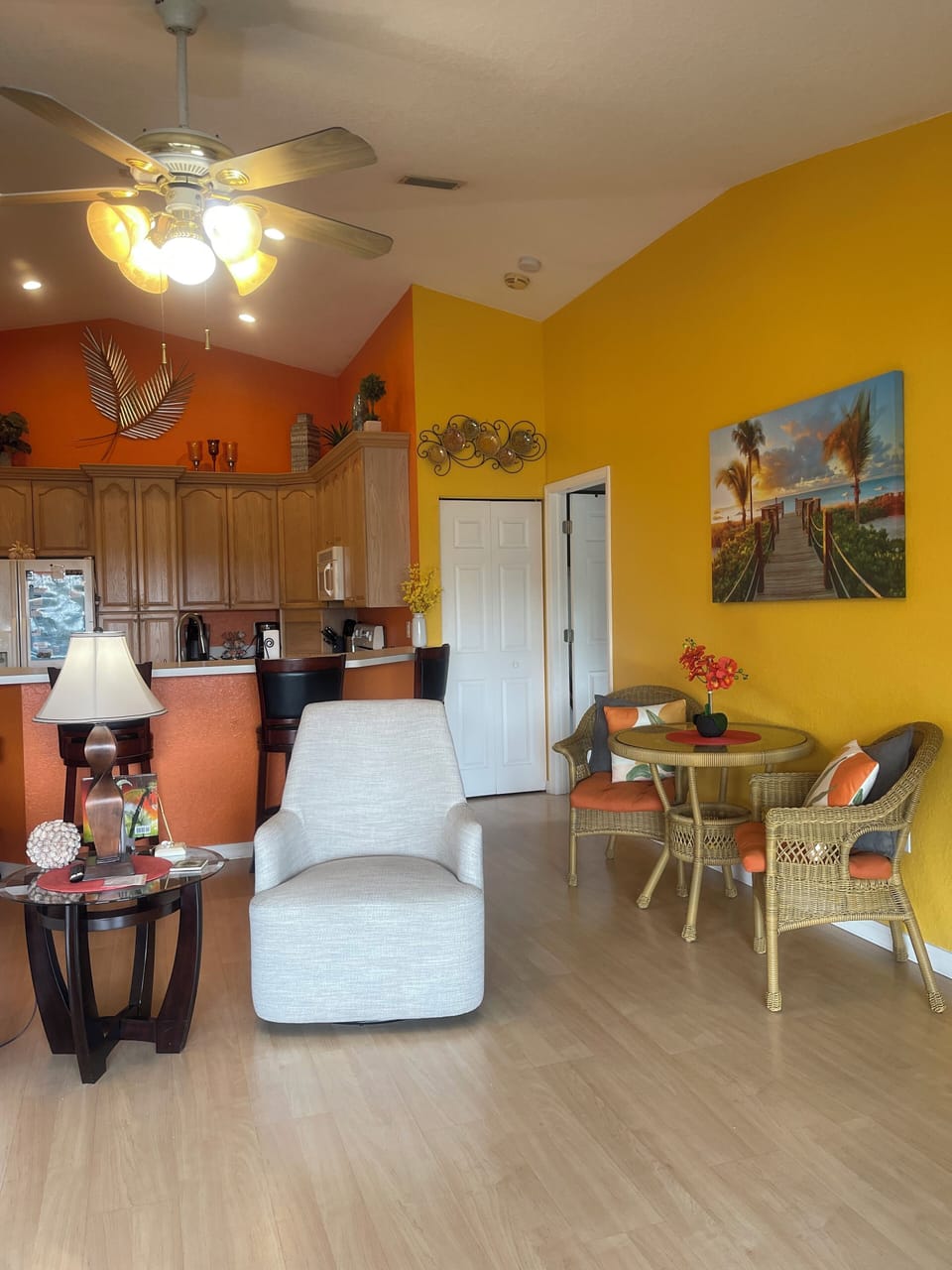 On the right of kitchen, is a door to a upright washer & dryer, beside MBedroom.