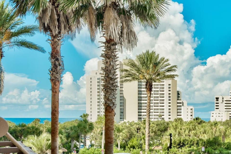 View from the balcony.  " Great host! Excellent communication and quick responses with lots of local tips. Check-in/out was a breeze. The unit is clean, comfy, as described, close to the pool, and VERY walkable to the beach. Provided beach accessories were
