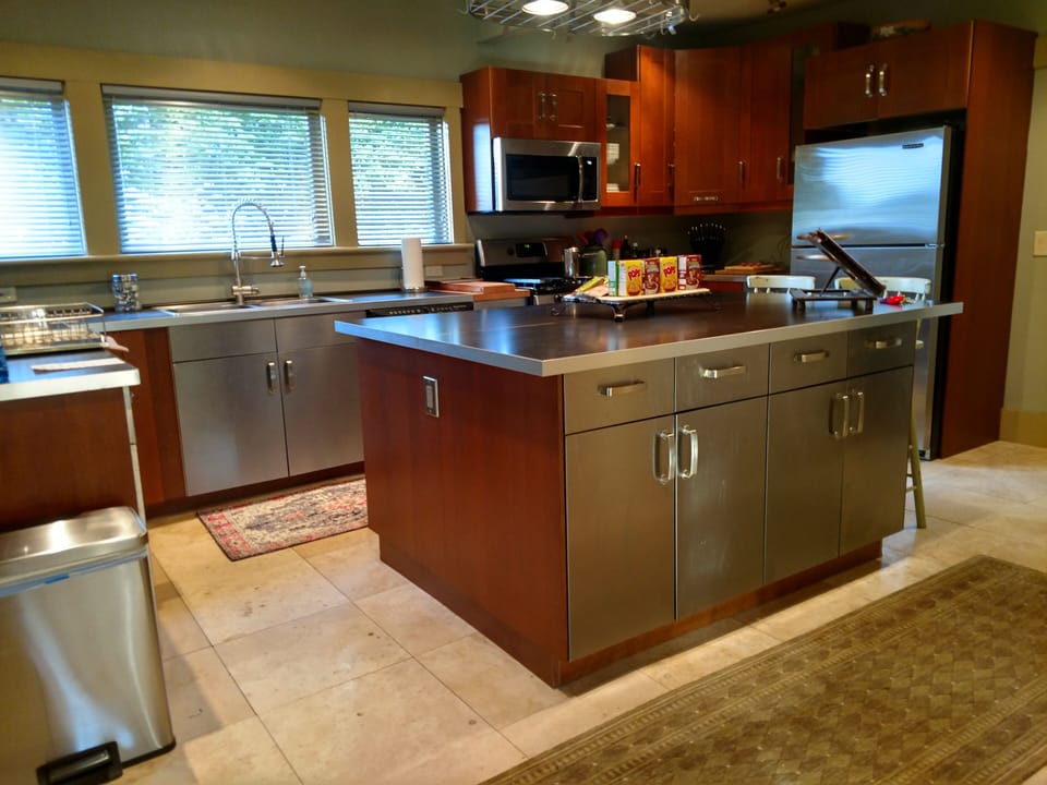 The all stainless steel kitchen has everything you need to prepare a feast...