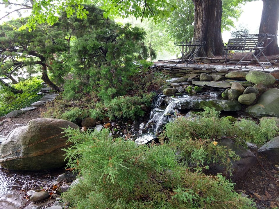 Enjoy the relaxing sounds of water spilling over rocks from our two waterfalls 