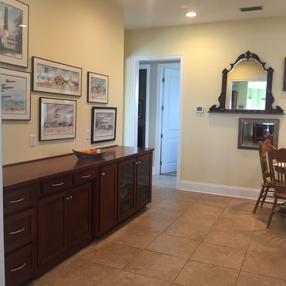 Buffet and Bistro table sitting area across from wet-bar