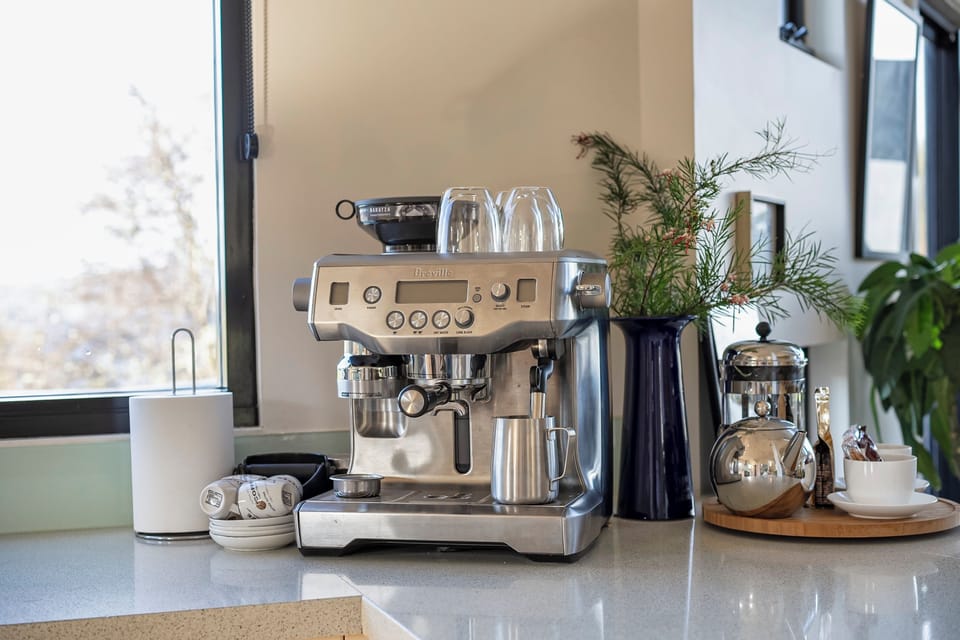 Breville dual boiler coffee machine!  Gets the coffees made in plenty of time!