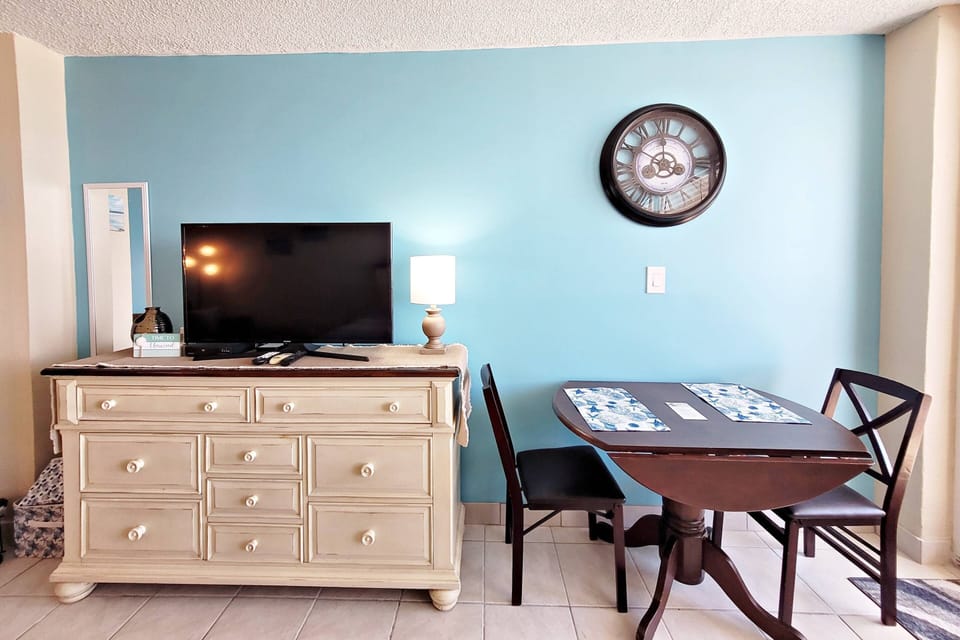 Long dresser and 2-3 person table with chairs.