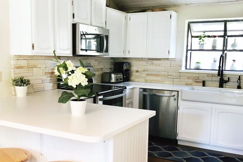 Kitchen newly remodeled, including appliances and farmhouse sink