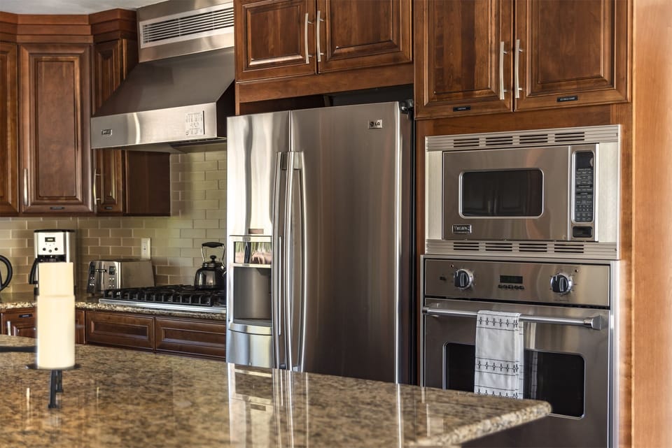 All the Tools You Need – With small appliances like a coffeemaker, wine chiller, rice cooker, and griddle, this well-equipped kitchen has everything for a convenient and enjoyable stay.