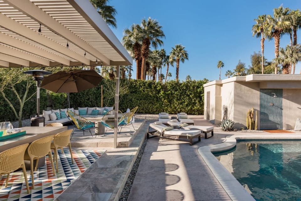 Resort-Style Comfort – Lounge in style on the plush sectional sofa and four lounge chairs, designed for ultimate relaxation.