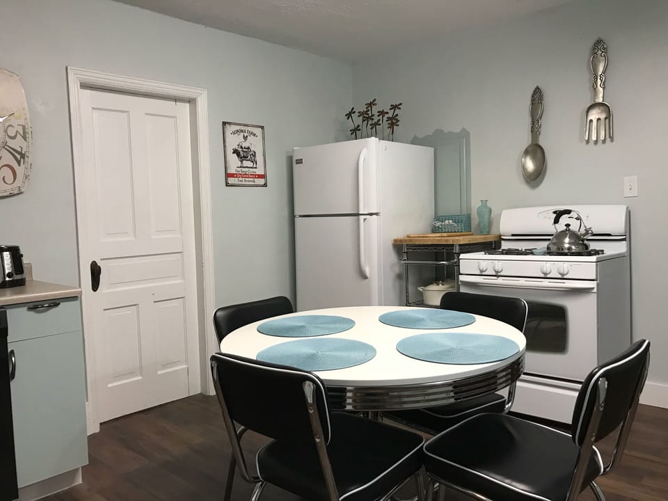 Retro dining set and fully equipped country kitchen. 