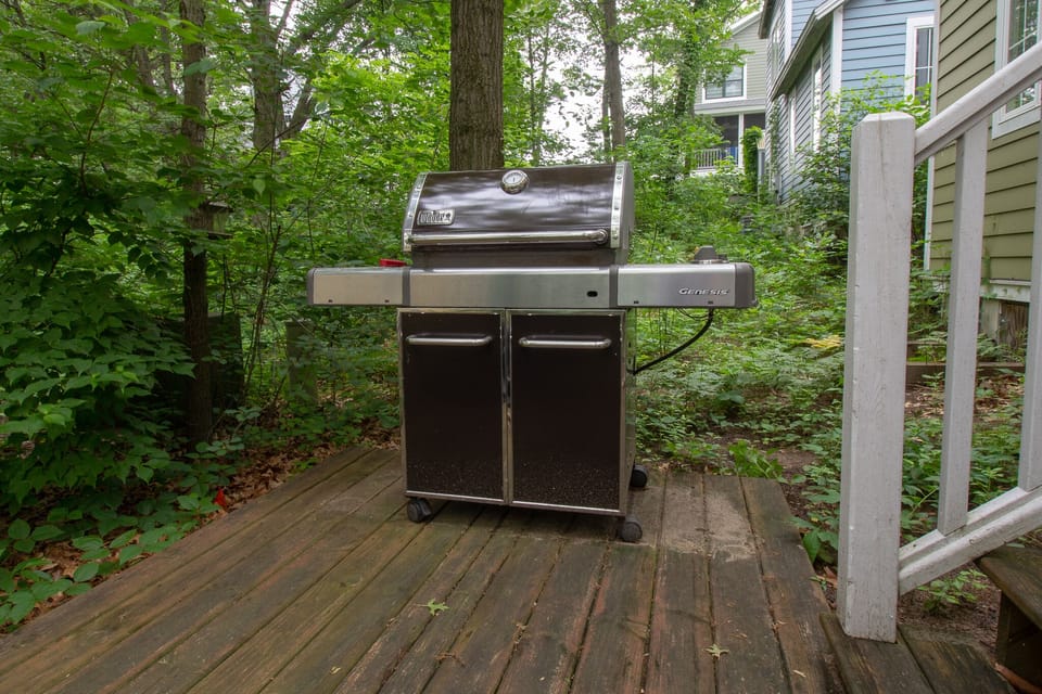 Outdoor Living | Grill Deck - Gas grill in the back of the home