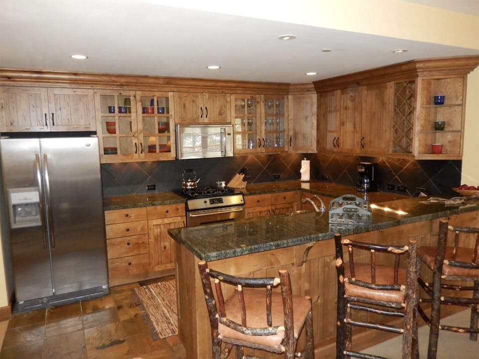 Gourmet Kitchen w/ granite counter tops and high end appliances.