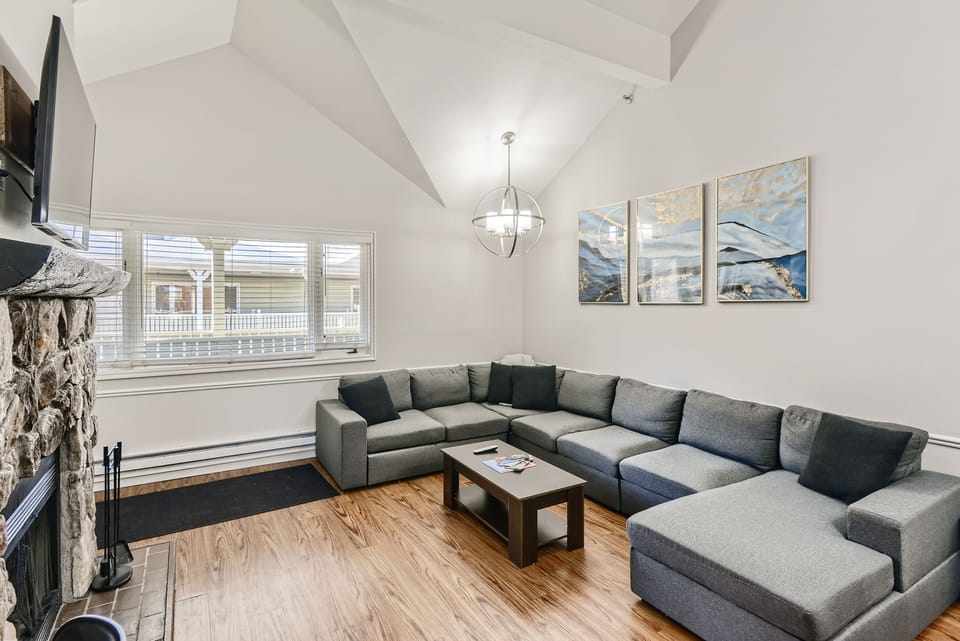 The Living room with large sofa and new TV set