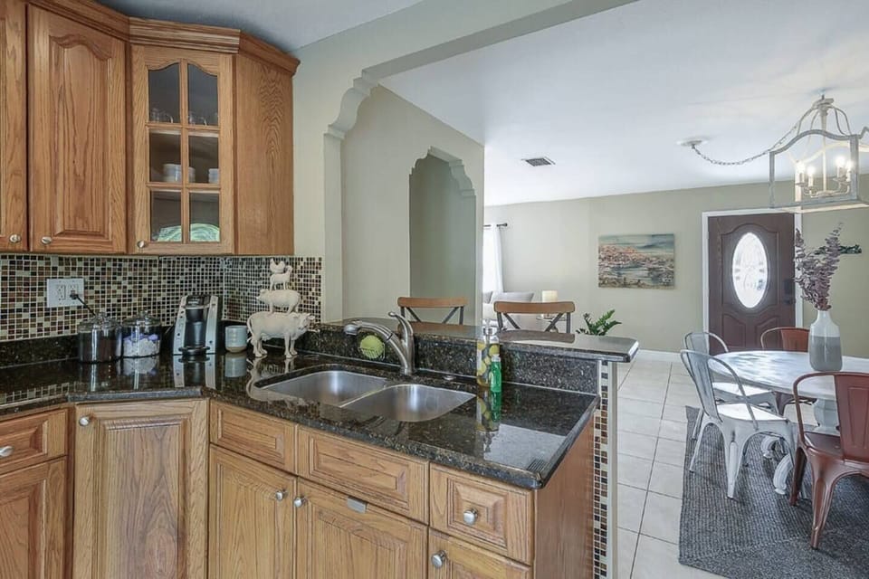 Kitchen Delight: Whip up culinary creations in this stylish kitchen with charming décor!