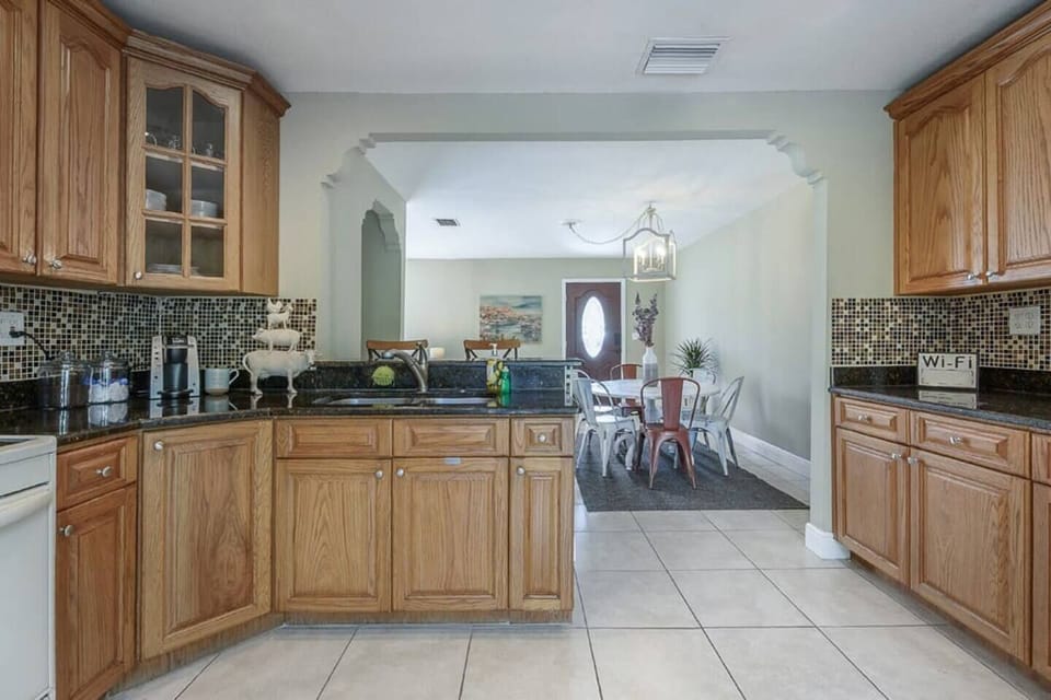 Kitchen Delight: Modern appliances and charming decor await your culinary adventures!