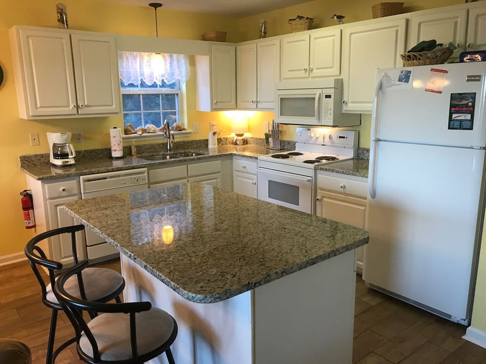 New granite countertops in kitchen.  Great for cooking and entertaining.