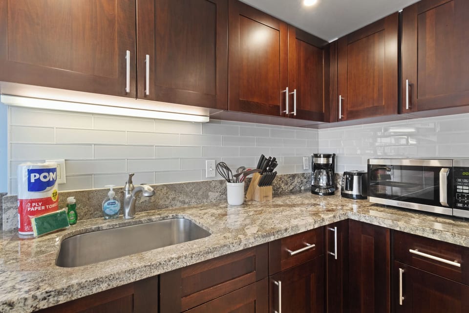 Kitchen - Fully equipped kitchen with all the you will need for your cooking needs! Toaster, microwave, coffee maker included!