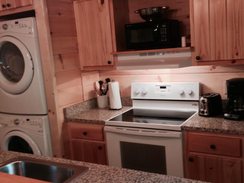 Cozy kitchen with rustic wood cabinets and modern appliances